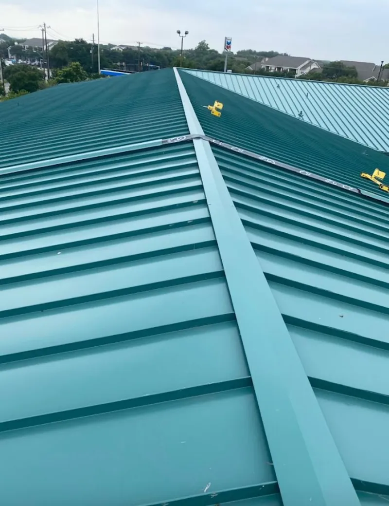 Green commercial metal roof ridge and valley for Metal Roof Repair in Webster City