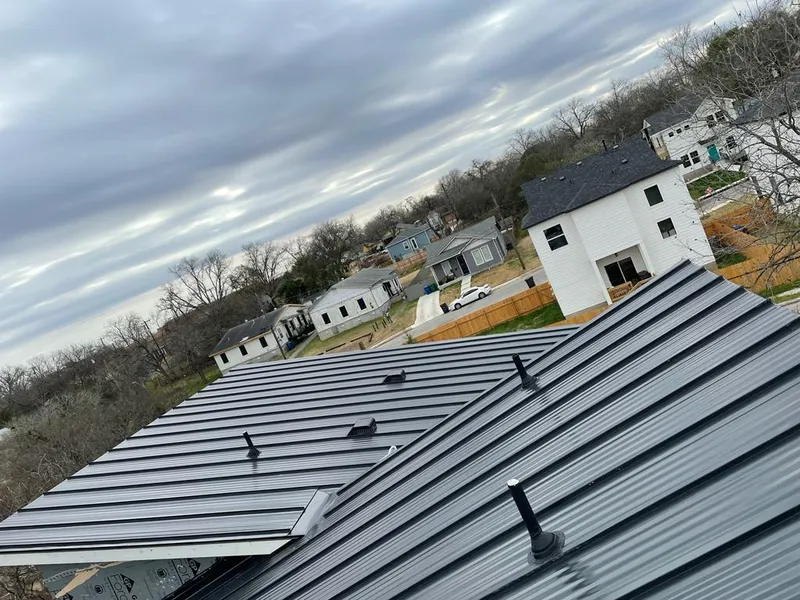 Standing seam metal roof panels with vents for Skylight Repair in Webster City